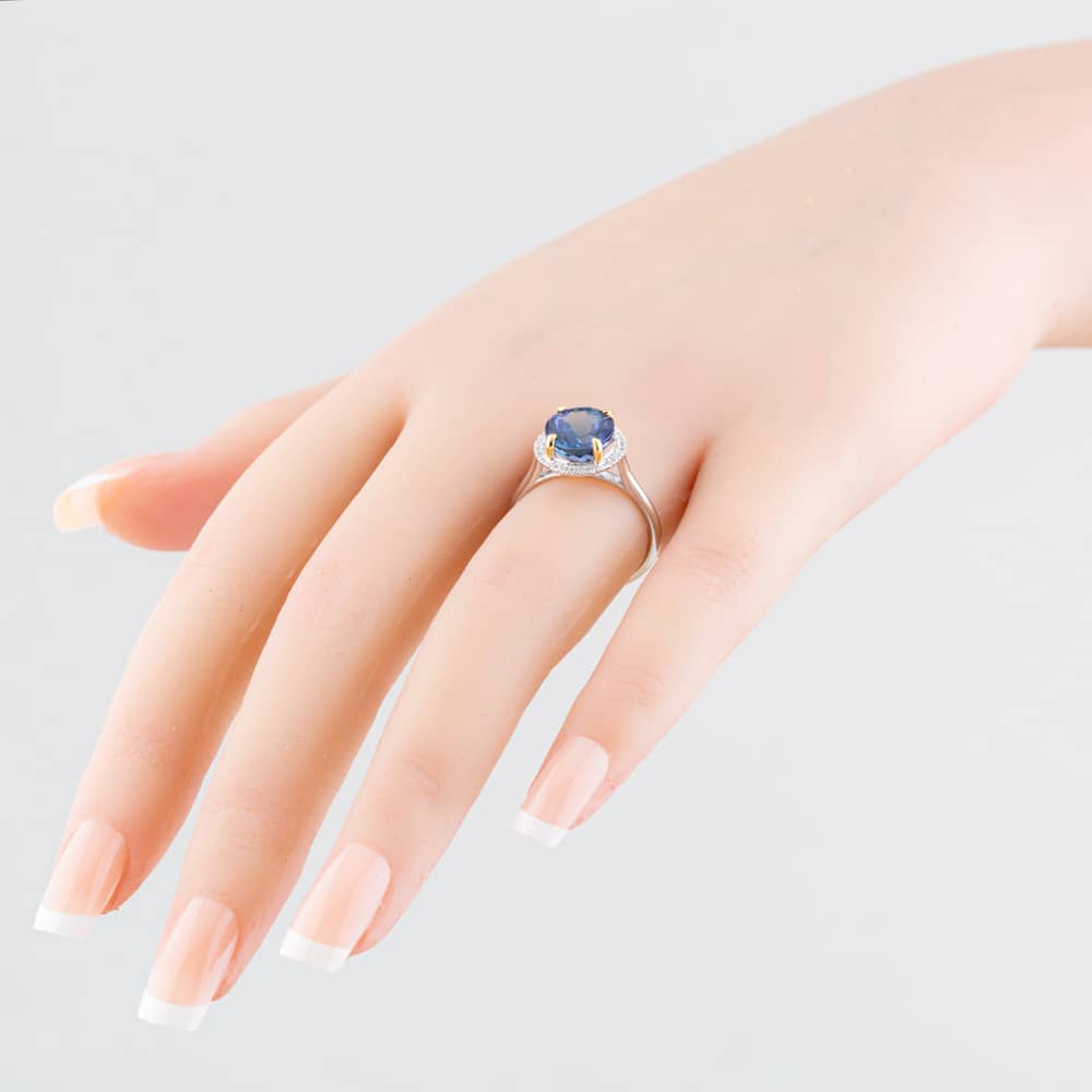 18ct White Gold 3.51ct Brilliant Cut Tanzanite & 0.12ct Diamond Halo Ring NTR2027GTZD-18YWG