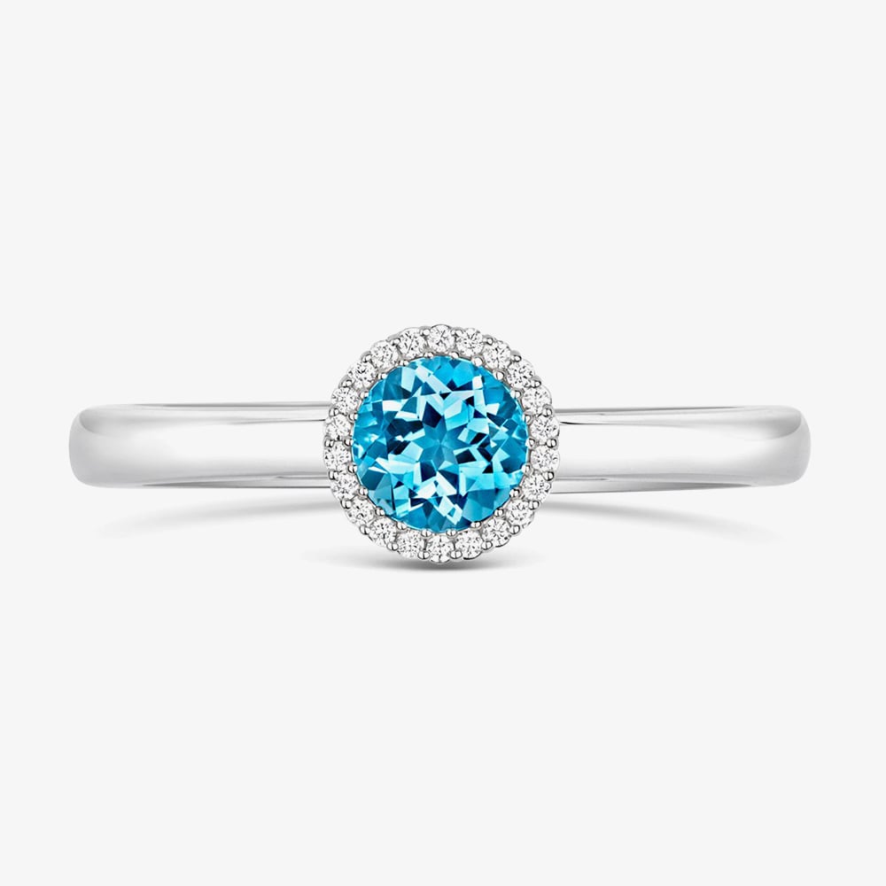 Product photograph of Tivon Classic 18ct White Gold 0 90ct Blue Topaz Amp 0 08ct Brilliant Cut Diamond Halo Ring Rw-1656-bt from The Jewel Hut