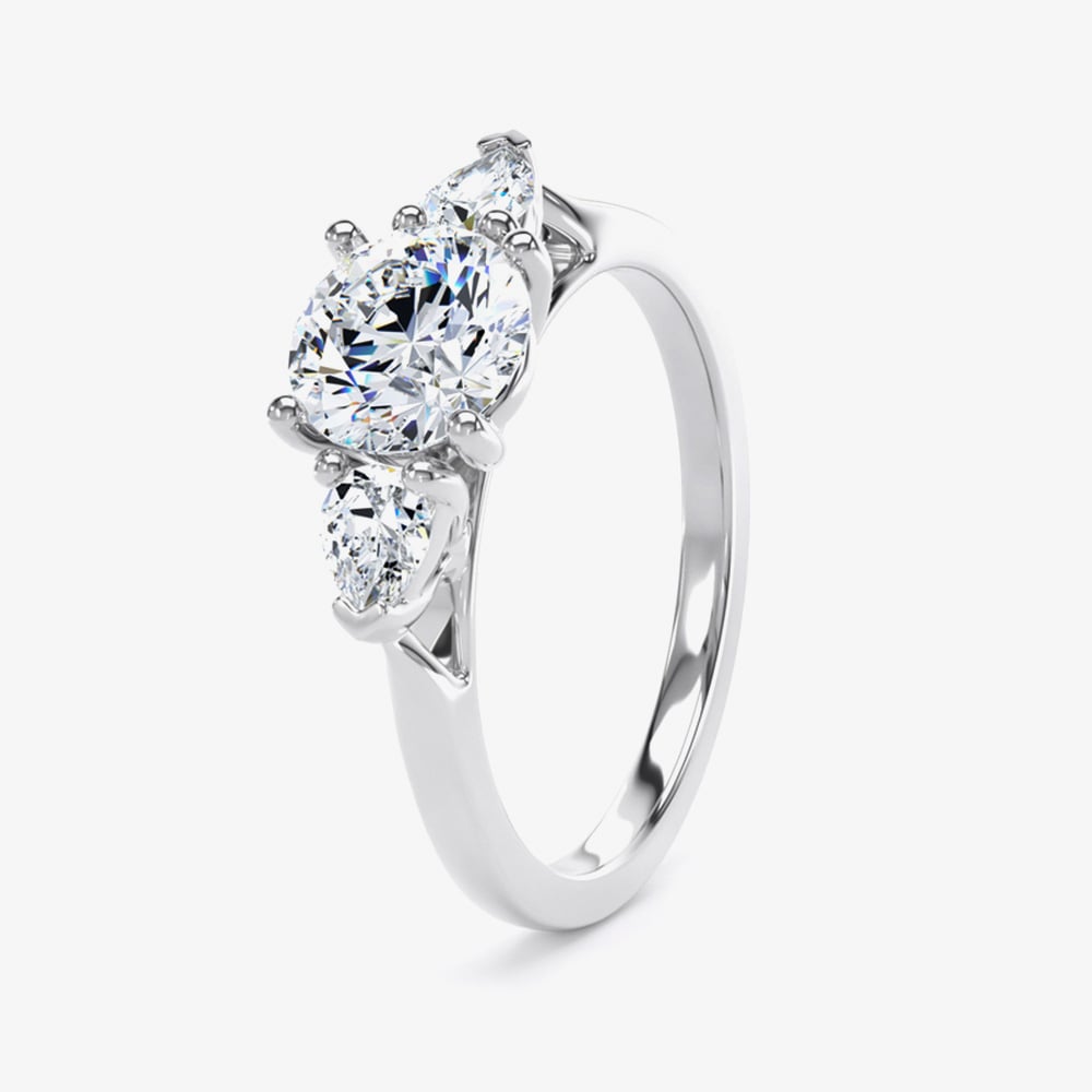 Click to view product details and reviews for Platinum Excellence Platinum 070ct Brilliant Cut And Pear Cut Diamond Three Stone Ring M3r03 050 070 Pt G Si1.