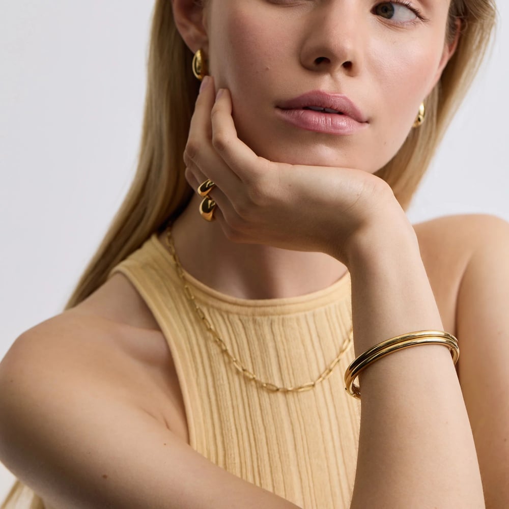D.Louise Yellow Gold Tone Plated Stainless Steel Classic Oval S/M Bangle YBB-014-01