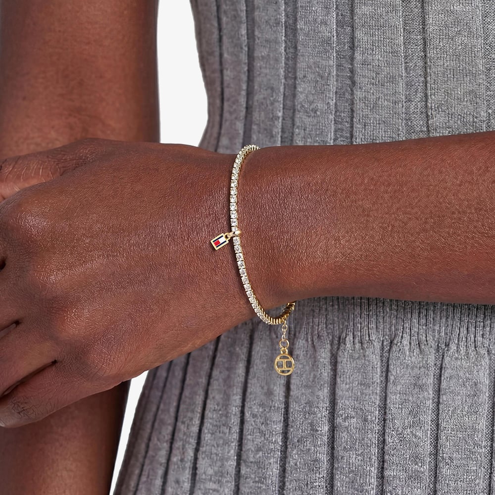 Tommy Hilfiger Yellow Gold Tone Plated Stainless Steel Cubic Zirconia Logo Charm Tennis Bracelet 2781093