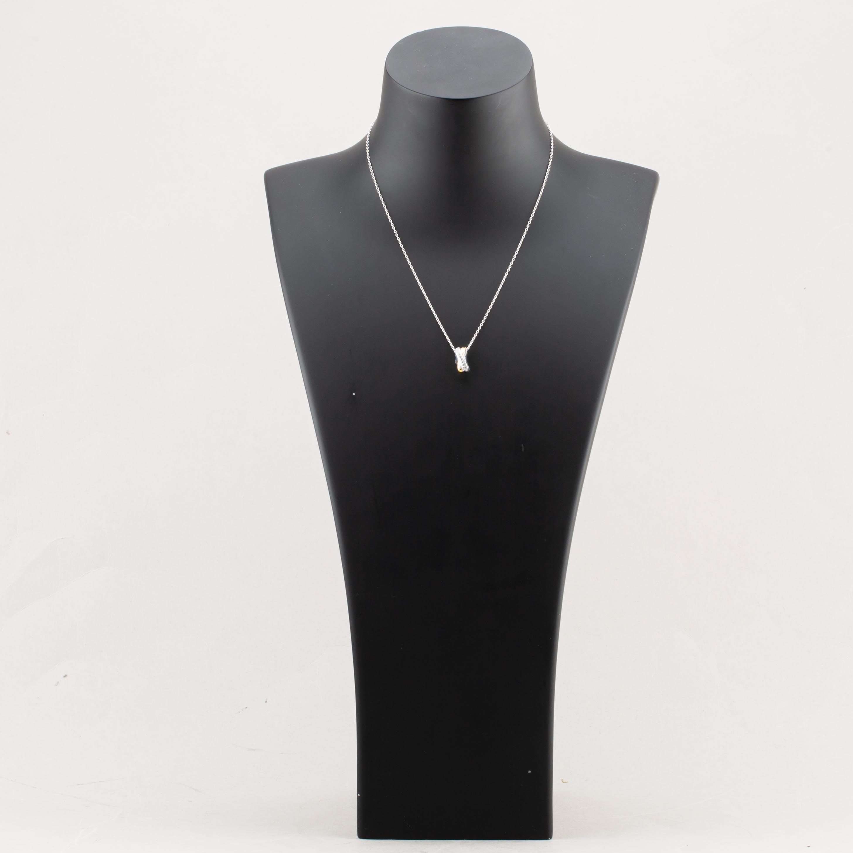 Fashionista Silver Two-Tone Cubic Zirconia Cross Over Pendant MK1069GO