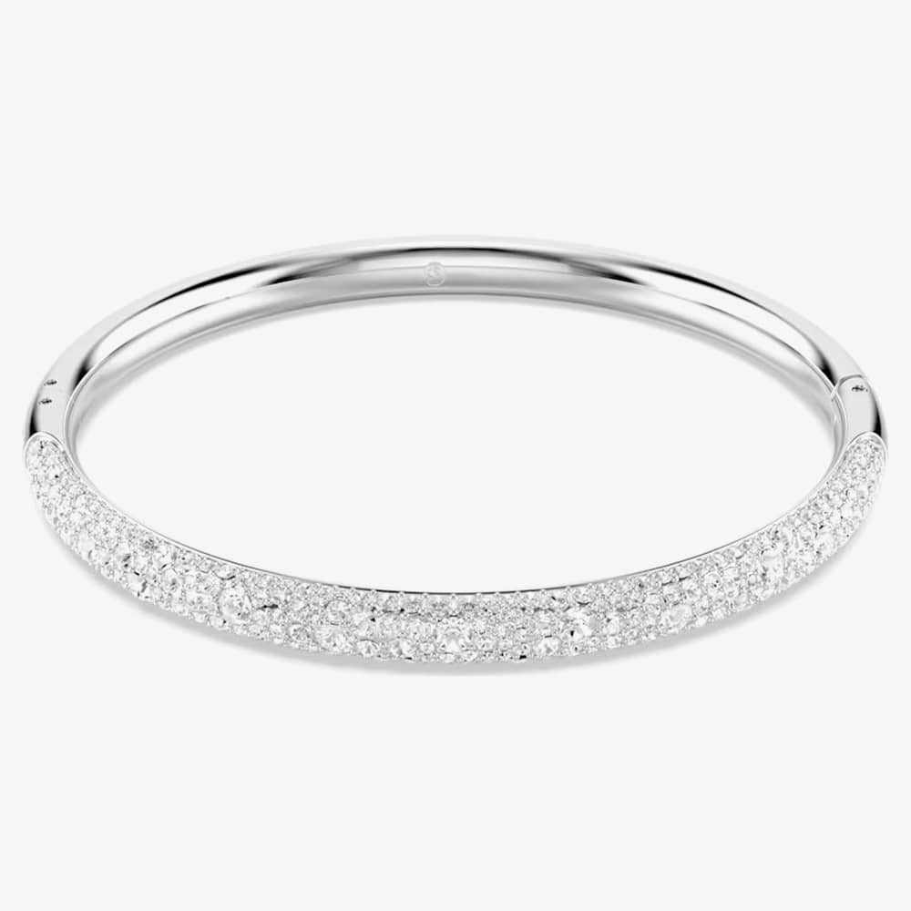 Product photograph of Swarovski Meteora Rhodium Plated Snow Pave Bangle 5684241 from The Jewel Hut