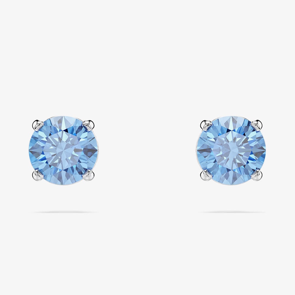 Click to view product details and reviews for Swarovski Stilla Attract Rhodium Plated Round Blue Zirconia Stud Earrings 5734250.