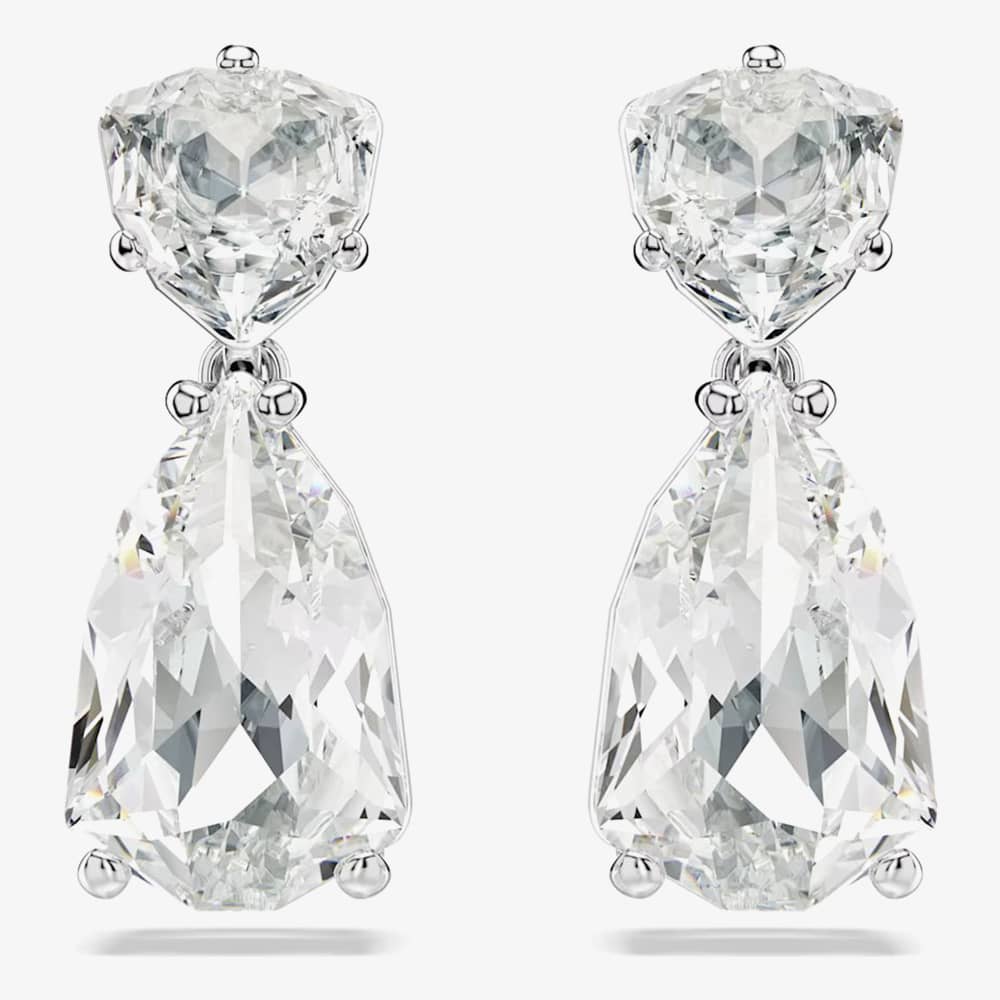 Product photograph of Swarovski Mesmera White Mixed Cut Rhodium Plated Earrings 5661683 from The Jewel Hut