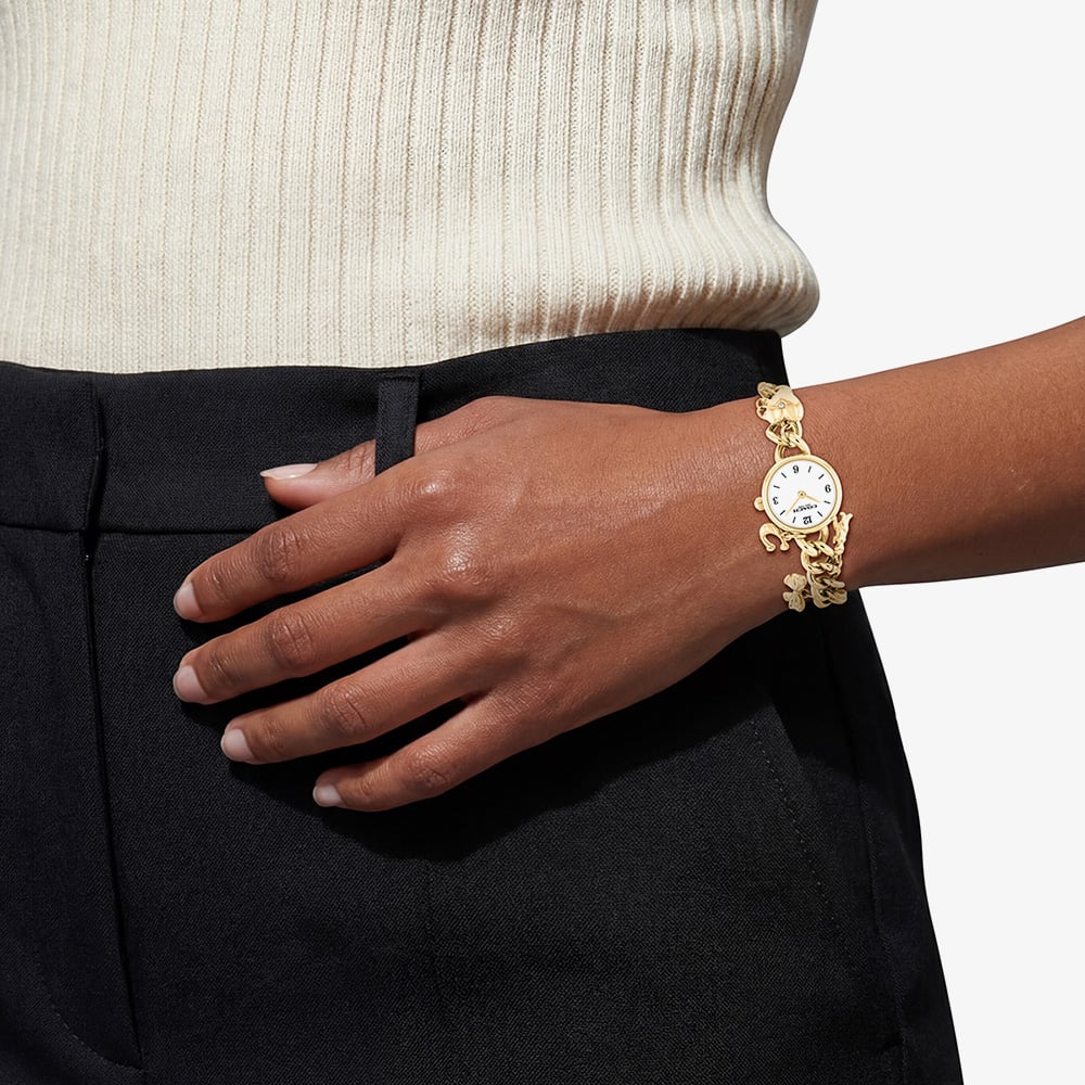 Coach Ladies Iris Gold Plated Charm Bracelet Watch 14504648