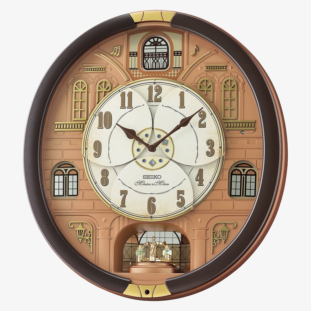 Seiko Melodies In Motion Brown Oval Wall Clock QXM601B