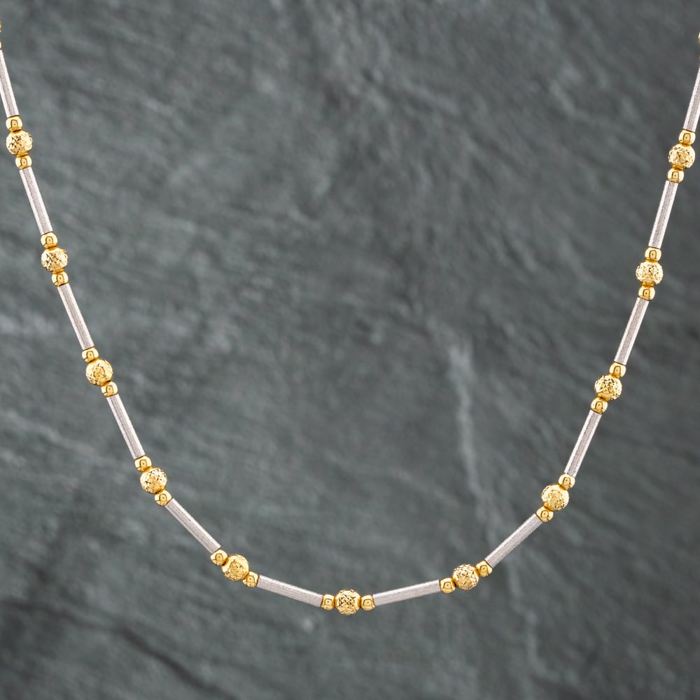 Product photograph of Pre-owned 14ct Two Colour Gold Ball Amp Bar 18 Inch Trace Chain 41041302 from The Jewel Hut