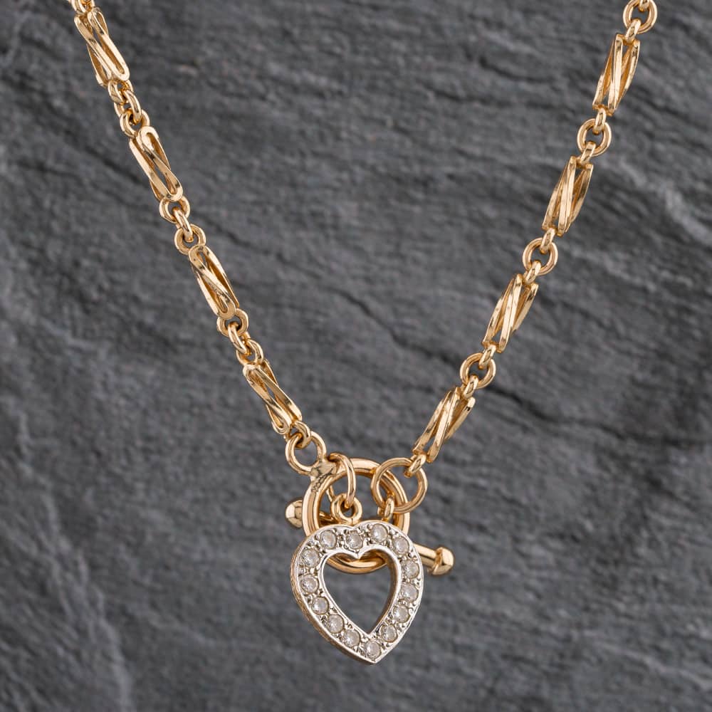 Product photograph of Pre-owned 9ct Yellow Gold Cubic Zirconia Heart T-bar Twisted 17 Inch Celtic Necklace 4104808 from The Jewel Hut