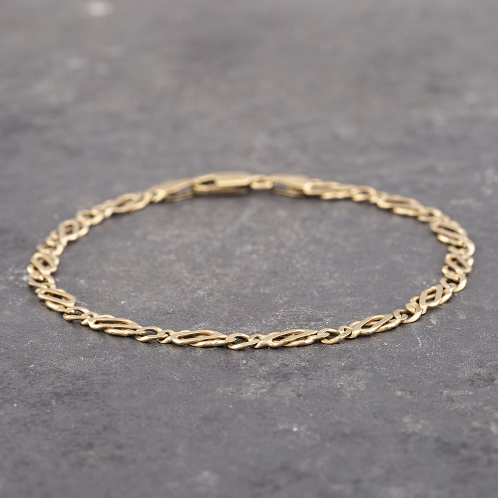Product photograph of Pre-owned 9ct Yellow Gold 7 Inch Celtic Chain Bracelet 41061207 from The Jewel Hut