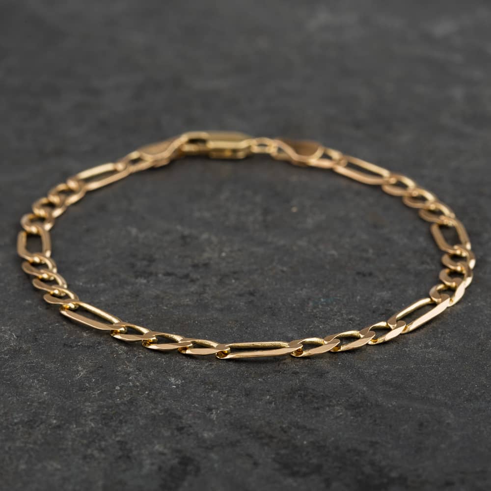 Product photograph of Pre-owned 9ct Yellow Gold Figaro Chain Bracelet 4106151 from The Jewel Hut