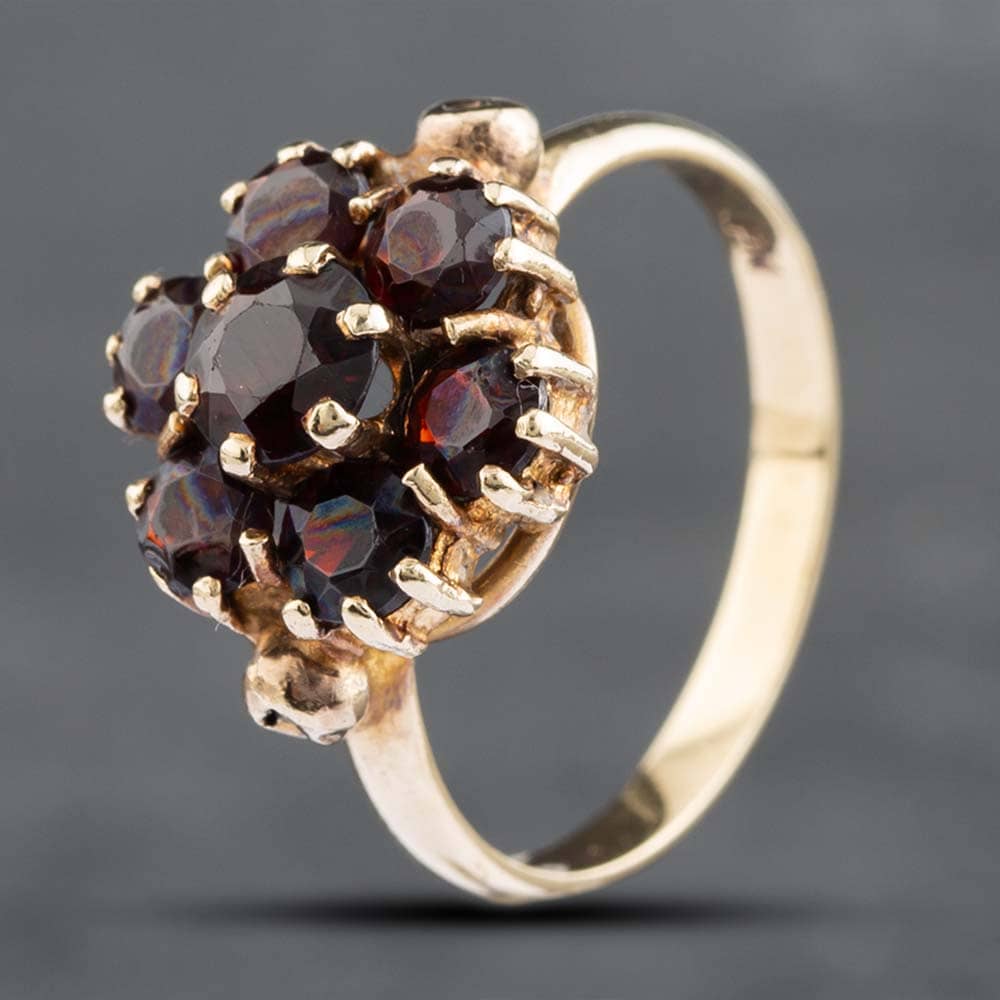 Product photograph of Pre-owned Vintage 9ct Yellow Gold Garnet Flower Cluster Ring 41101517 from The Jewel Hut