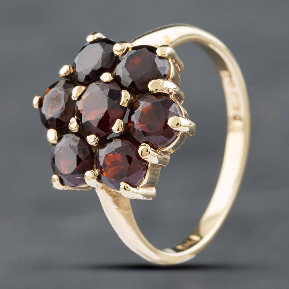 Product photograph of Pre-owned 9ct Yellow Gold Garnet Flower Cluster Ring 41101549 from The Jewel Hut