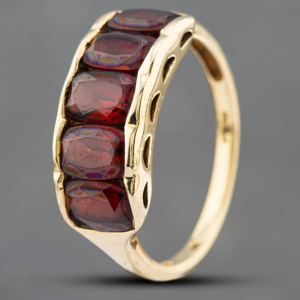 Product photograph of Pre-owned 9ct Yellow Gold Garnet Five Stone Ring 41101895 from The Jewel Hut