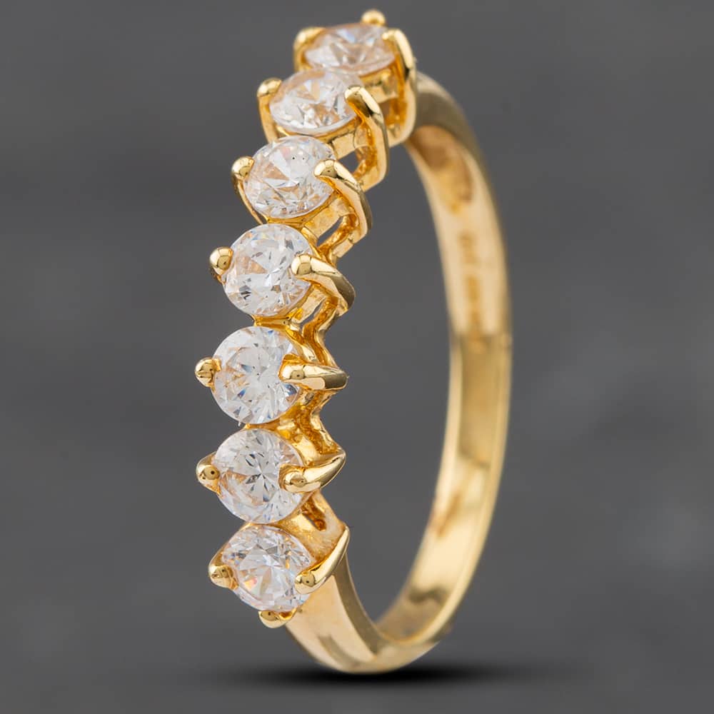 Product photograph of Pre-owned 14ct Yellow Gold Cubic Zirconia Seven Stone Ring 41101944 from The Jewel Hut