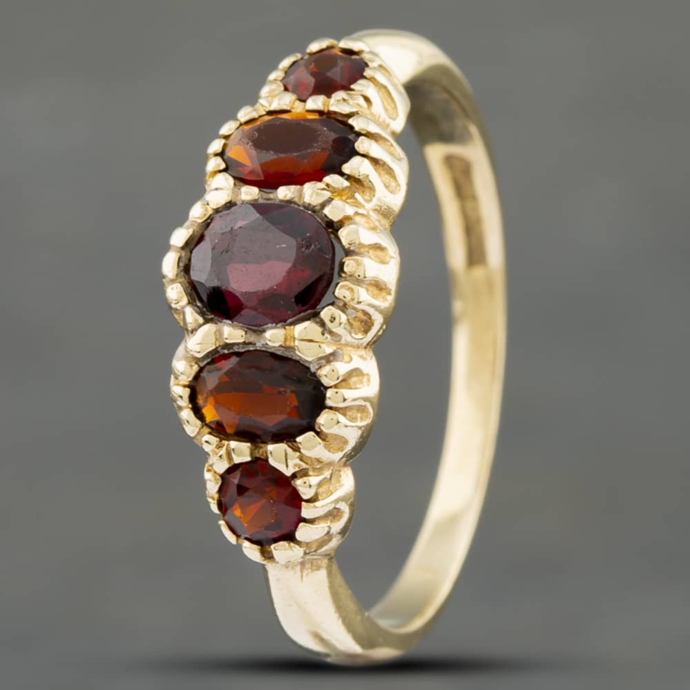 Product photograph of Pre-owned 9ct Yellow Gold Garnet Five Stone Ring 41102189 from The Jewel Hut
