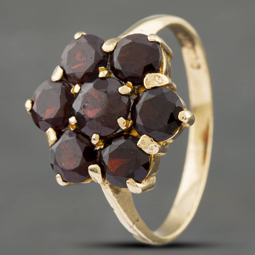 Product photograph of Pre-owned Vintage 9ct Yellow Gold Garnet Cluster Ring 41102198 from The Jewel Hut