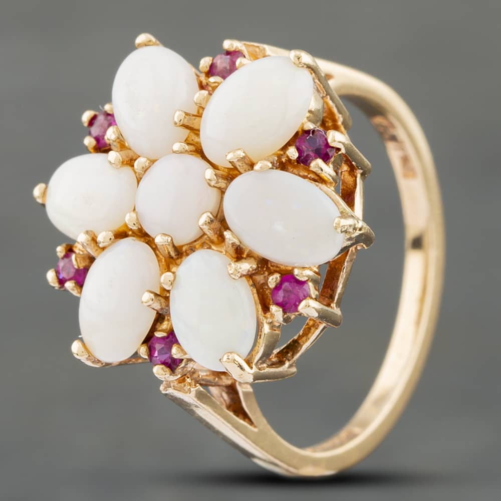 Click to view product details and reviews for Pre Owned Vintage 9ct Yellow Gold Oval Opal And Pink Topaz Cluster Ring 41102205. Click to view product details and reviews for Pre Owned Vintage 9ct Yellow Gold Oval Opal And Pink Topaz Cluster Ring 41102205.