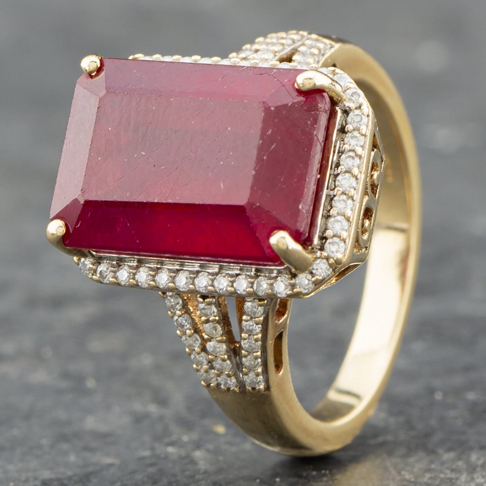 Product photograph of Pre-owned 9ct Yellow Gold Ruby Amp Moissanite Oblong Cluster Ring 41102317 from The Jewel Hut