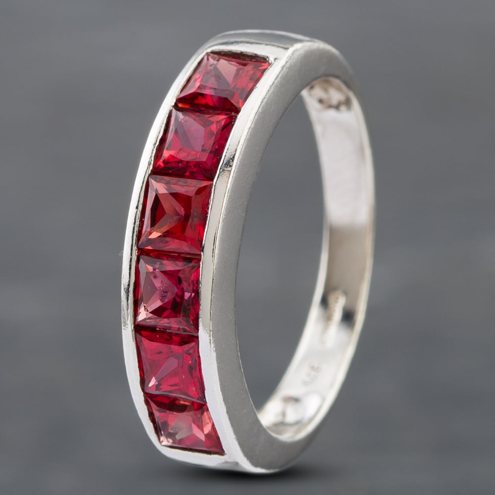 Product photograph of Pre-owned 9ct White Gold Topaz Half Eternity Ring 41102363 from The Jewel Hut