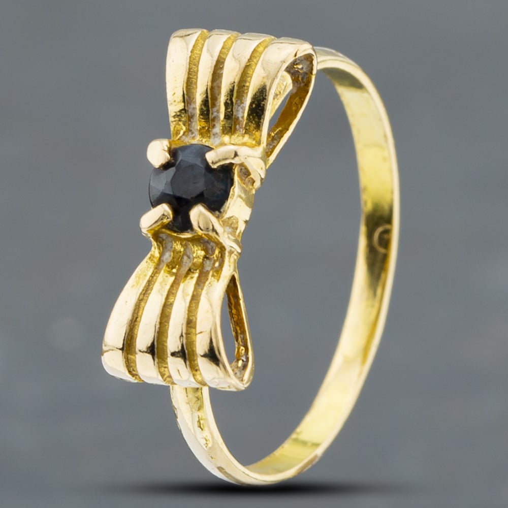 Product photograph of Pre-owned 18ct Yellow Gold Sapphire Set Bow Dress Ring 41102388 from The Jewel Hut