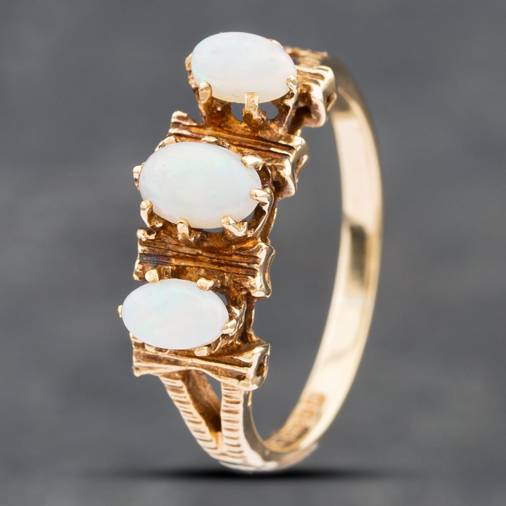 Product photograph of Pre-owned Vintage 9ct Yellow Gold Opal Three Stone Ring 41102431 from The Jewel Hut