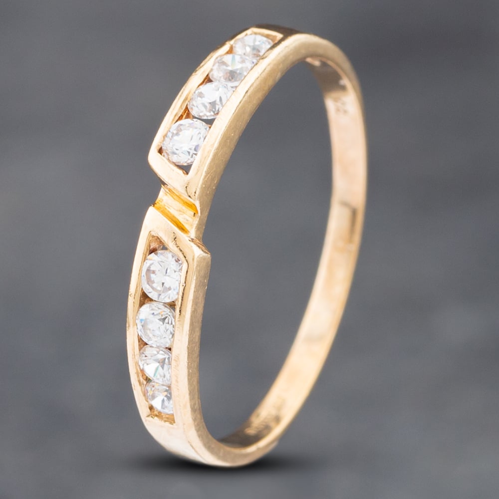 Product photograph of Pre-owned 9ct Yellow Gold Cubic Zirconia 8 Stone Half Eternity Ring 41102472 from The Jewel Hut
