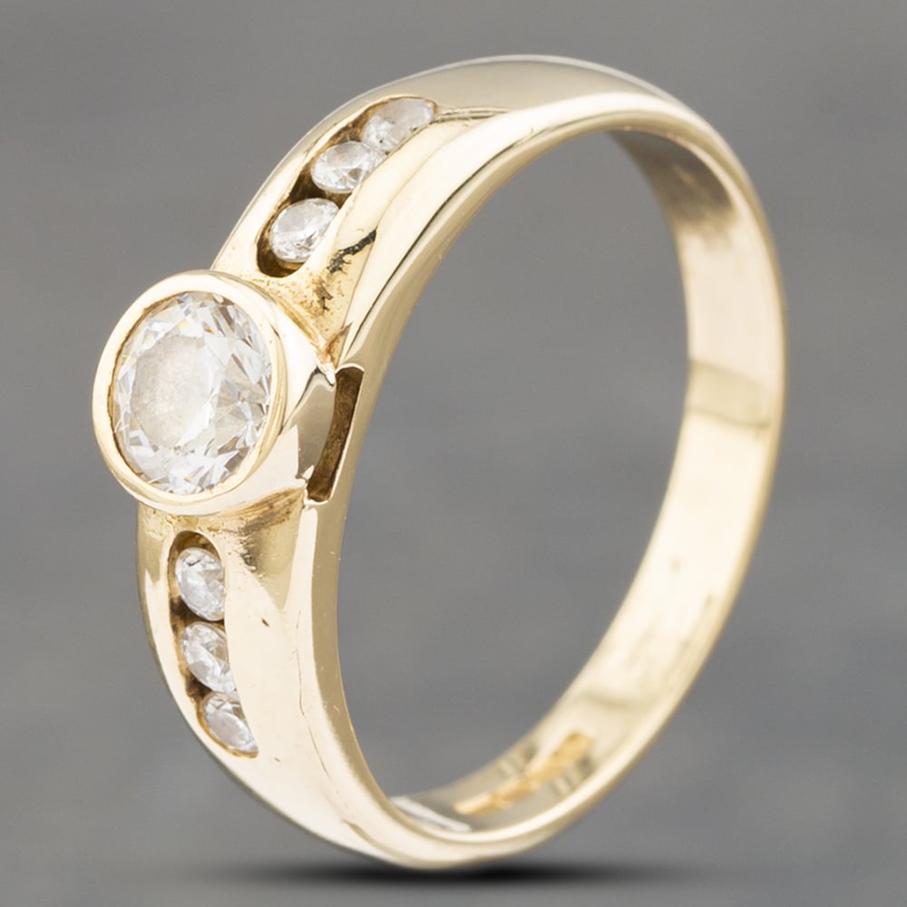 Product photograph of Pre-owned 9ct Yellow Gold Cubic Zirconia Shoulder Set Solitaire Ring 41102519 from The Jewel Hut