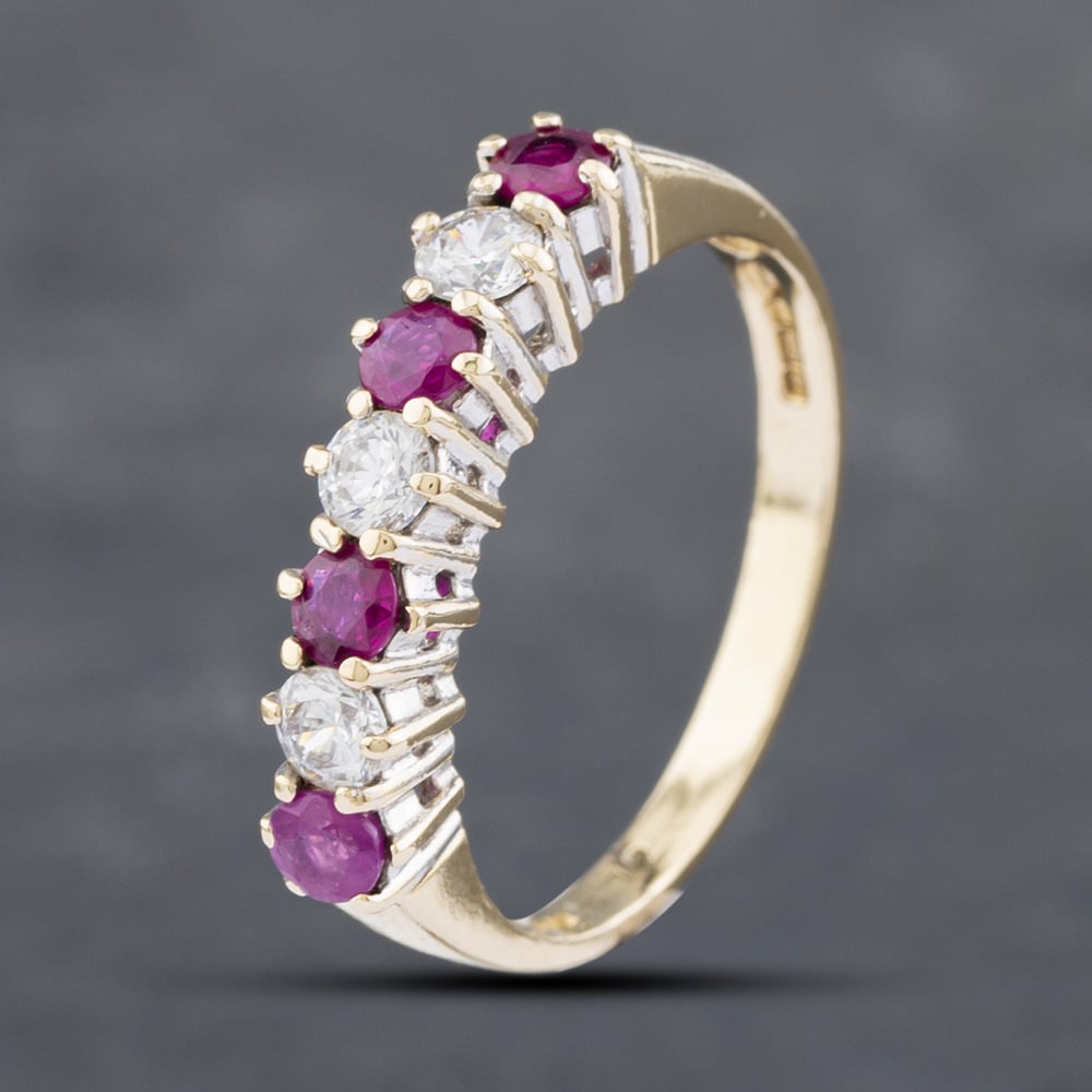 Product photograph of Pre-owned 9ct Yellow Gold Ruby Amp Cubic Zirconia Half Eternity Ring 41102590 from The Jewel Hut