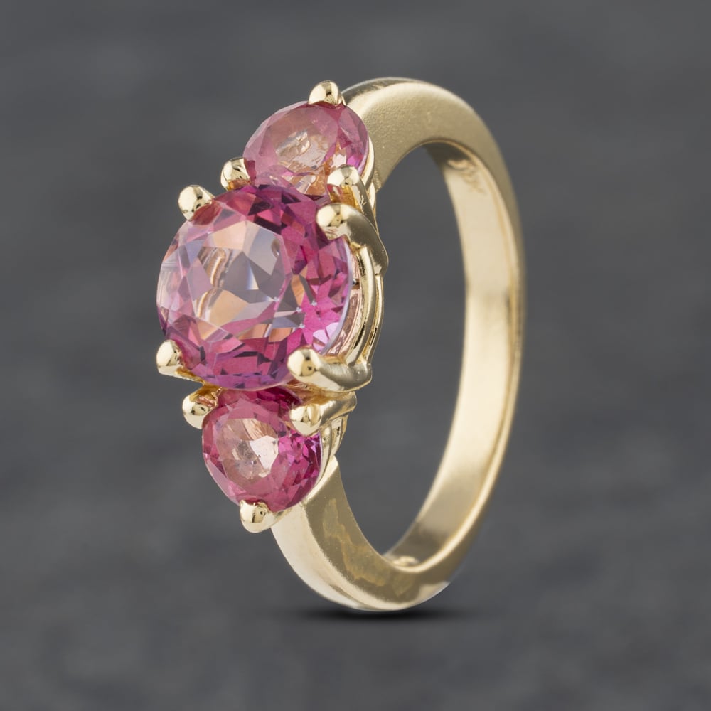 Click to view product details and reviews for Pre Owned 14ct Yellow Gold Colour Treated Topaz Three Stone Dress Ring 41102616.