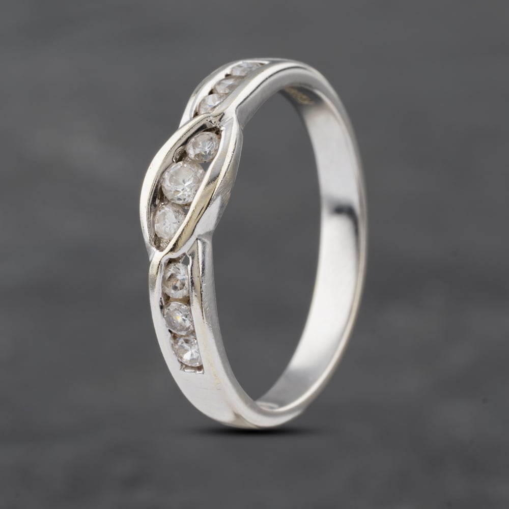 Click to view product details and reviews for Pre Owned 9ct White Gold Cubic Zirconia Crossover Channel Set Half Eternity Ring 41103037. Click to view product details and reviews for Pre Owned 9ct White Gold Cubic Zirconia Crossover Channel Set Half Eternity Ring 41103037.