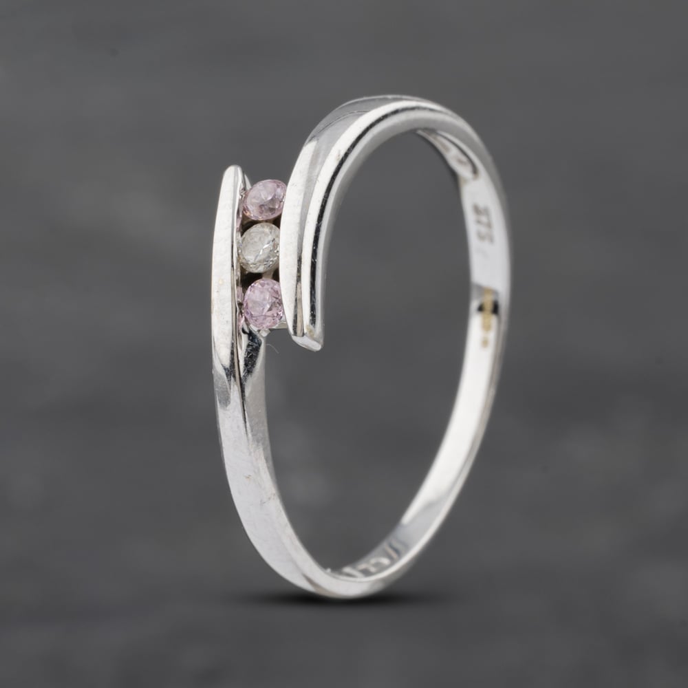 Click to view product details and reviews for Pre Owned 9ct White Gold Cubic Zirconia Tension Set Crossover Three Stone Ring 41103039. Click to view product details and reviews for Pre Owned 9ct White Gold Cubic Zirconia Tension Set Crossover Three Stone Ring 41103039.