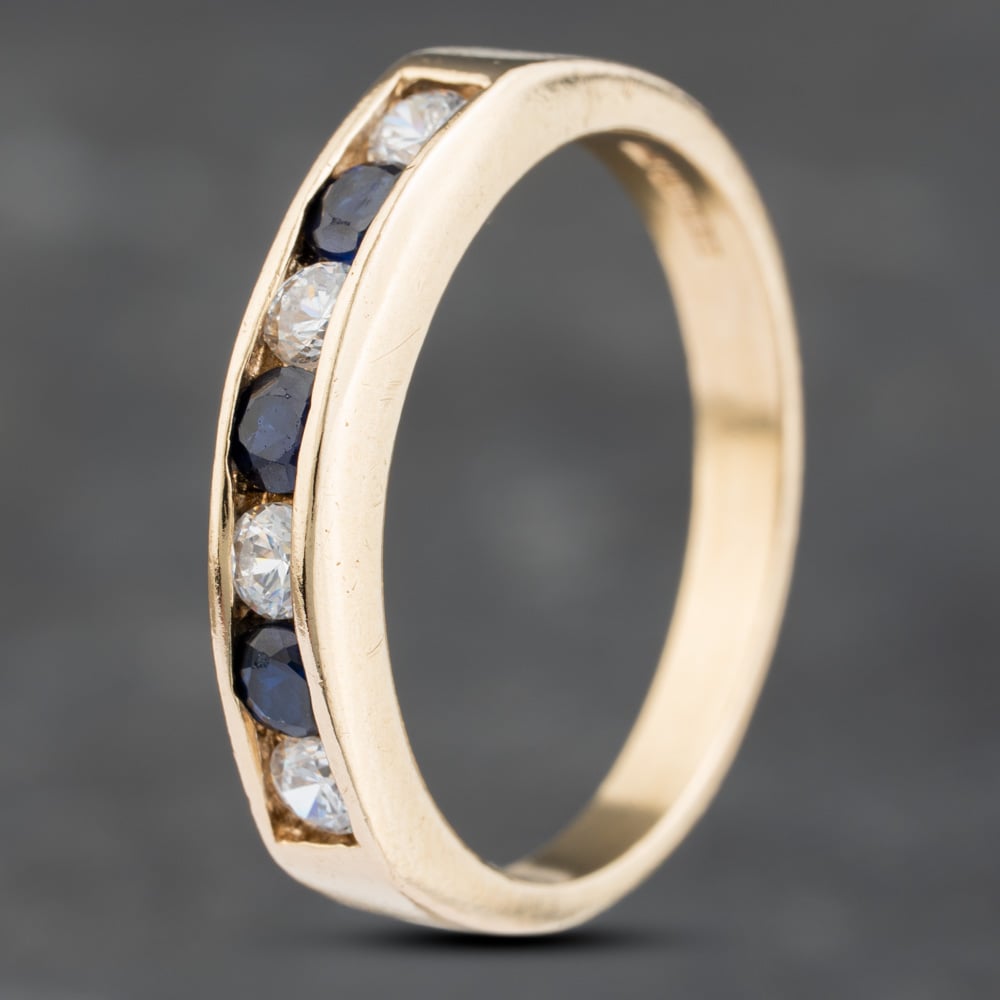 Click to view product details and reviews for Pre Owned 9ct Yellow Gold Sapphire And Cubic Zirconia Channel Set Half Eternity Ring 41103179. Click to view product details and reviews for Pre Owned 9ct Yellow Gold Sapphire And Cubic Zirconia Channel Set Half Eternity Ring 41103179.