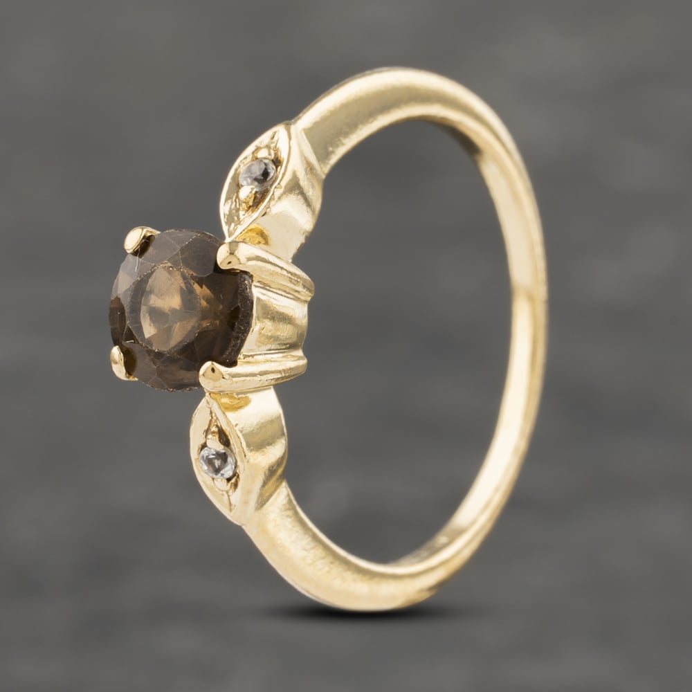Click to view product details and reviews for Pre Owned 9ct Yellow Gold Smokey Quartz And White Topaz Shoulders Dress Ring 41103262. Click to view product details and reviews for Pre Owned 9ct Yellow Gold Smokey Quartz And White Topaz Shoulders Dress Ring 41103262.