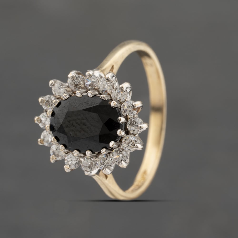 Click to view product details and reviews for Pre Owned 9ct Yellow Gold Sapphire And Cubic Zirconia Oval Cluster Ring 41103440. Click to view product details and reviews for Pre Owned 9ct Yellow Gold Sapphire And Cubic Zirconia Oval Cluster Ring 41103440.