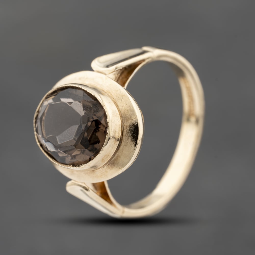 Click to view product details and reviews for Pre Owned 9ct Yellow Gold Smokey Quartz Oval Dress Ring 41103813.