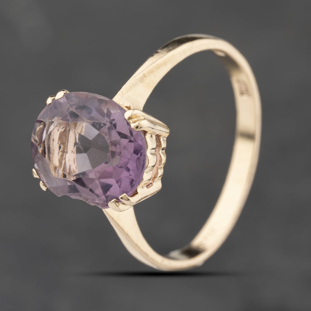 Click to view product details and reviews for Pre Owned 9ct Yellow Gold Amethyst Oval Dress Ring 41103844.