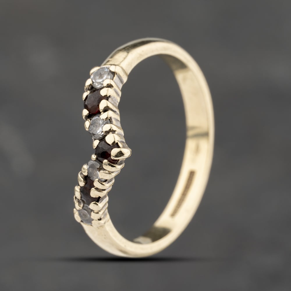 Click to view product details and reviews for Pre Owned 9ct Yellow Gold Garnet And Cubic Zirconia Half Wishbone Ring 41103868. Click to view product details and reviews for Pre Owned 9ct Yellow Gold Garnet And Cubic Zirconia Half Wishbone Ring 41103868.