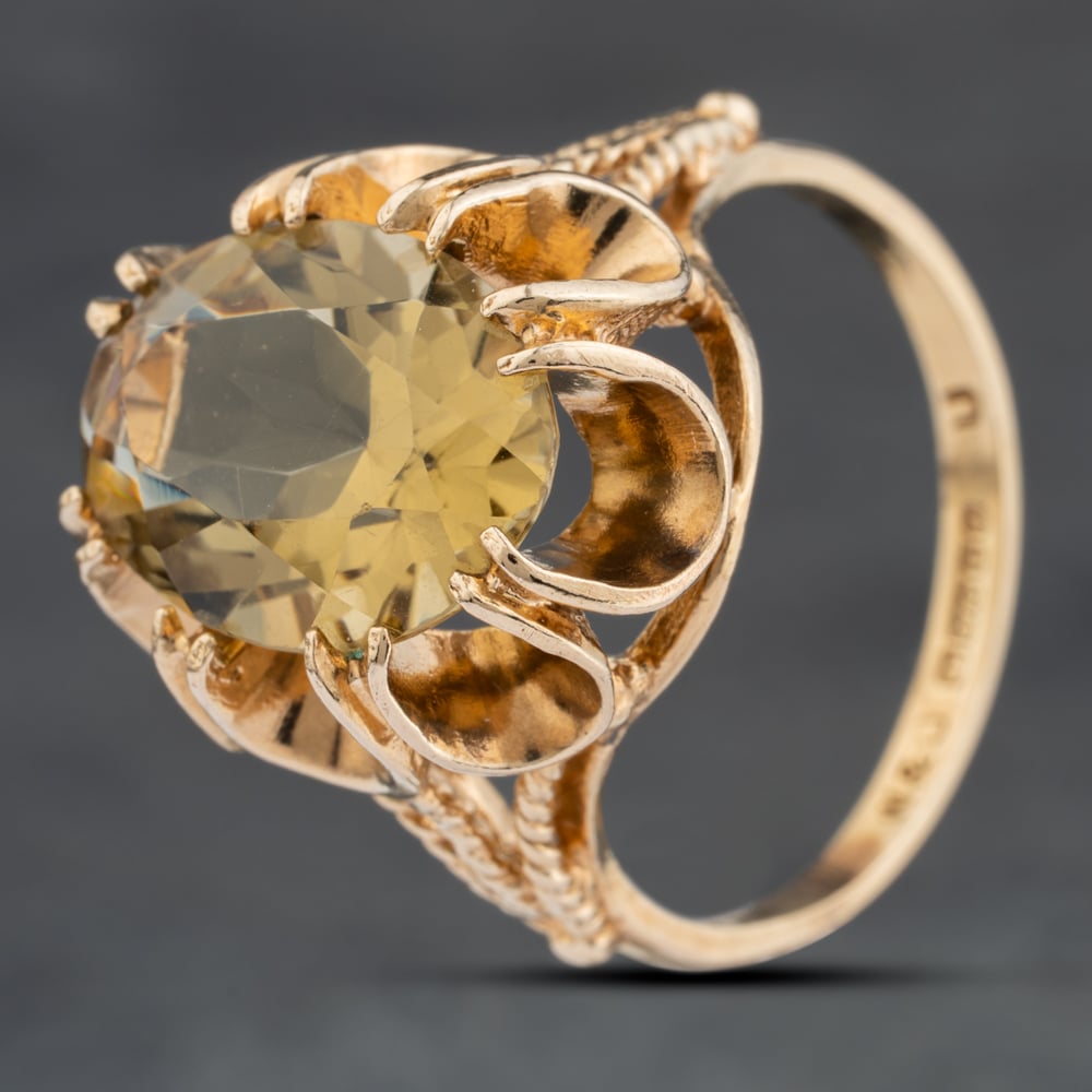 Click to view product details and reviews for Pre Owned 9ct Yellow Gold Smoky Quartz Large Oval Scallop Edge Dress Ring 41103965.