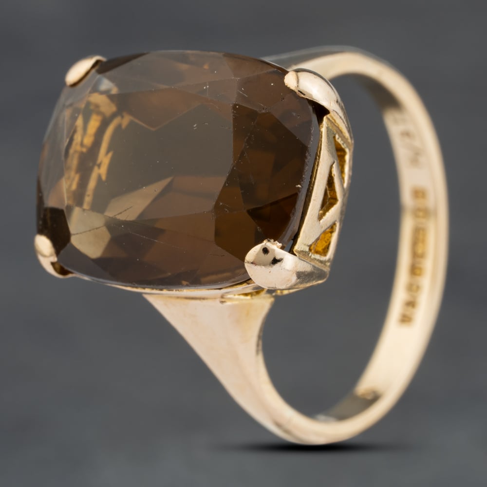 Click to view product details and reviews for Pre Owned 9ct Yellow Gold Smoky Quartz Large Oblong Dress Ring 41103985.
