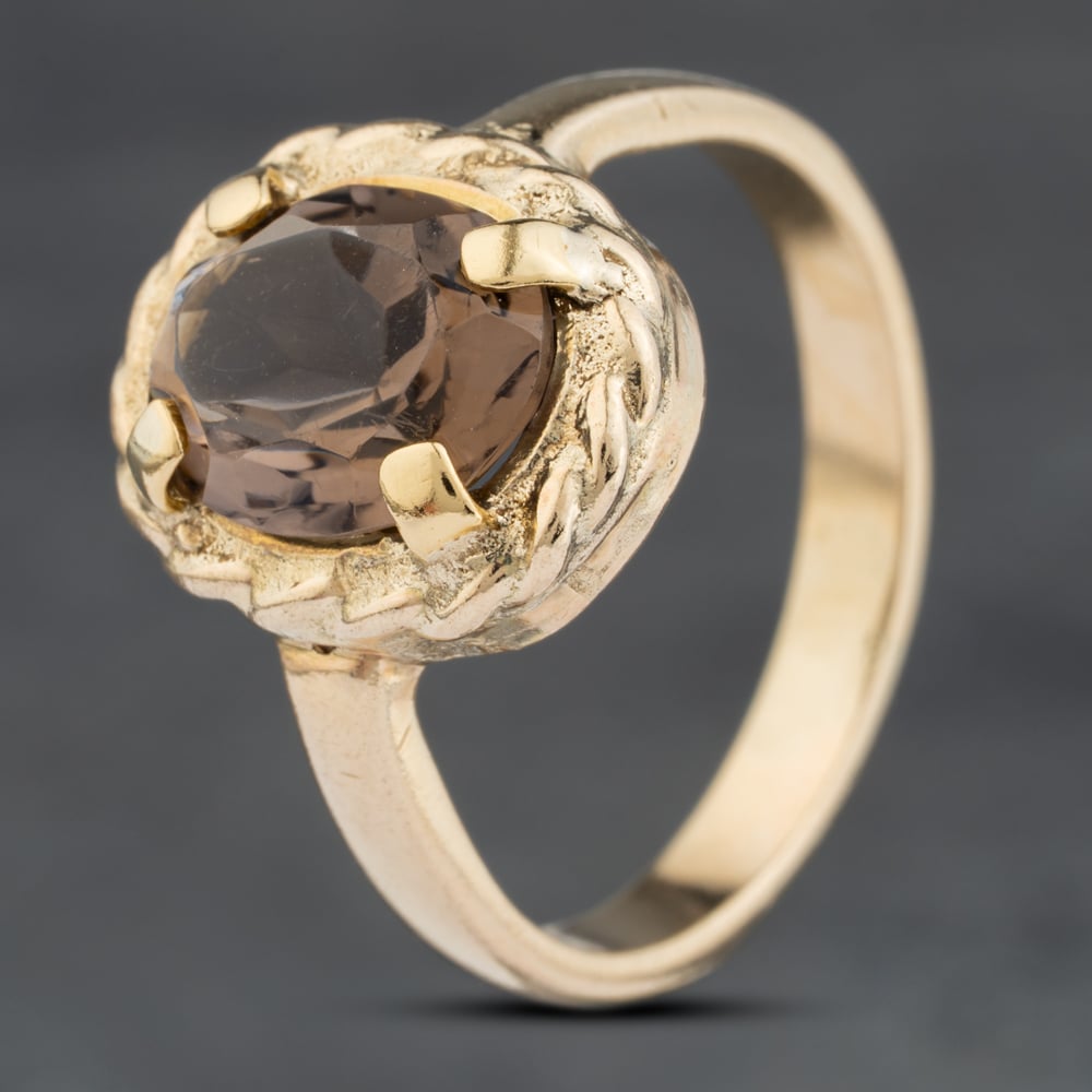 Click to view product details and reviews for Pre Owned Vintage Yellow Gold Smoky Quartz Oval Rope Edge Dress Ring 41103990. Click to view product details and reviews for Pre Owned Vintage Yellow Gold Smoky Quartz Oval Rope Edge Dress Ring 41103990.