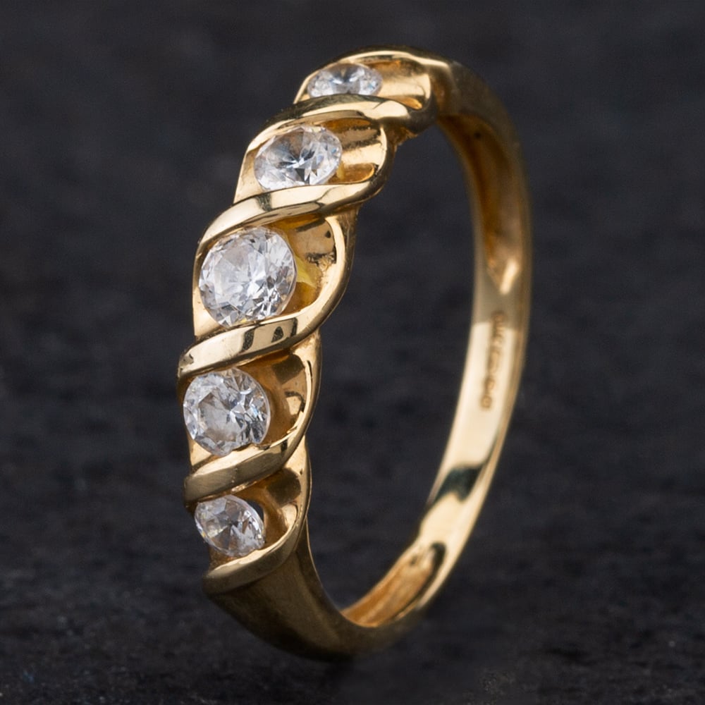 Product photograph of Pre-owned 14ct Yellow Gold Cubic Zirconia Five Stone Ring 4110707 from The Jewel Hut