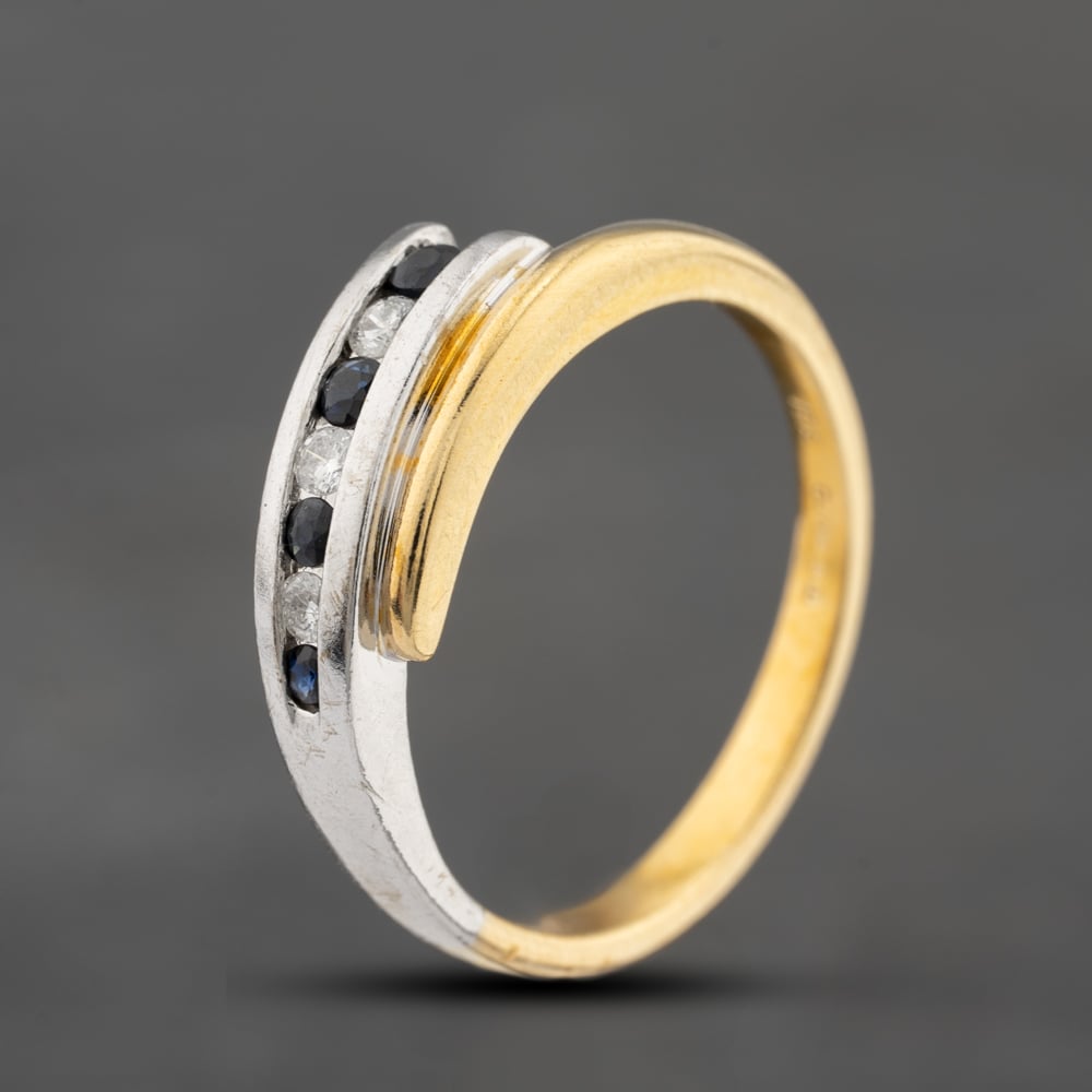 Click to view product details and reviews for Pre Owned 18ct Two Colour Gold Sapphire And Brilliant Cut Diamond Crossover Ring 41121022.