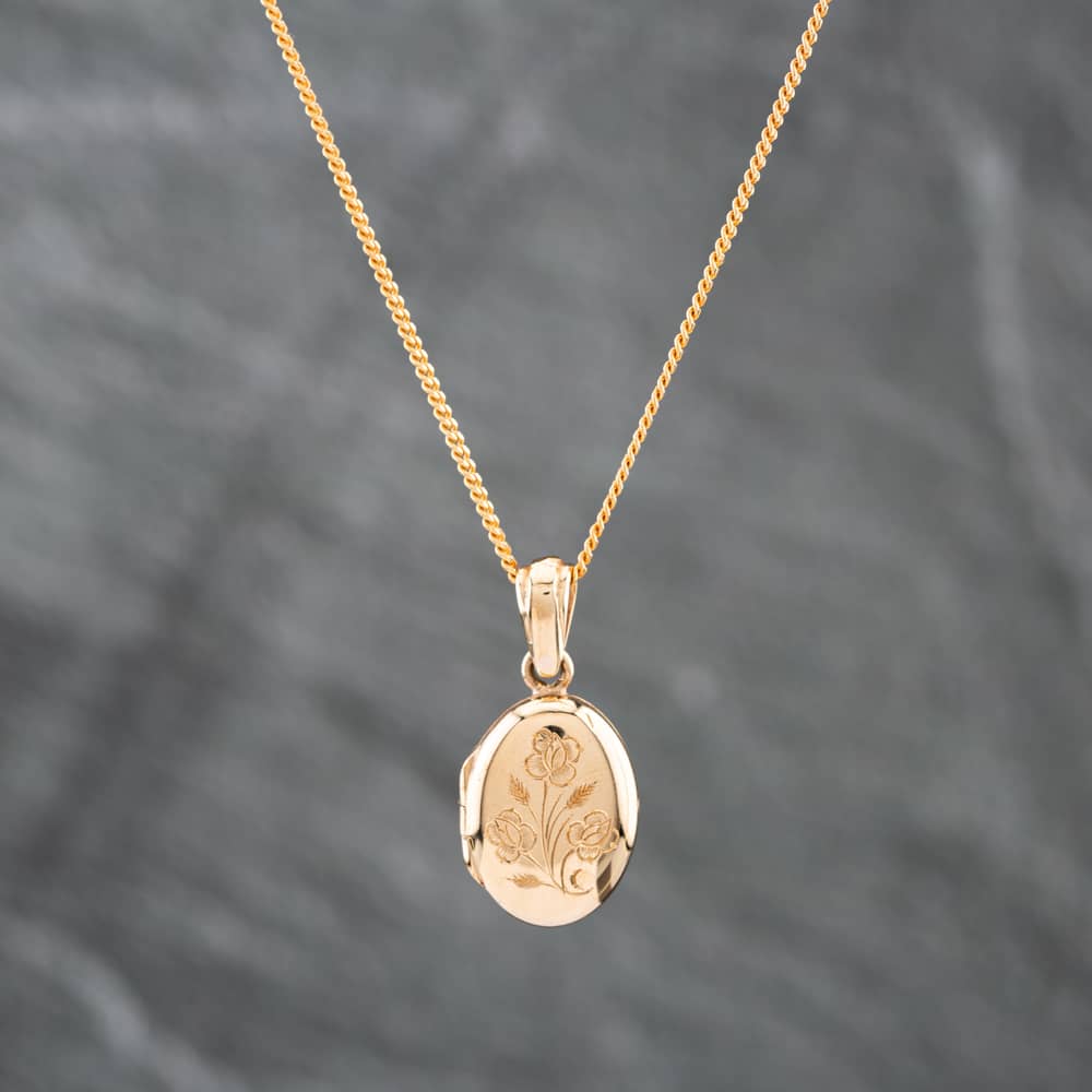 Product photograph of Pre-owned 9ct Yellow Gold Oval Hand Engraved Flowers Locket Pendant Amp 16 Inch Curb Chain 41141904 from The Jewel Hut