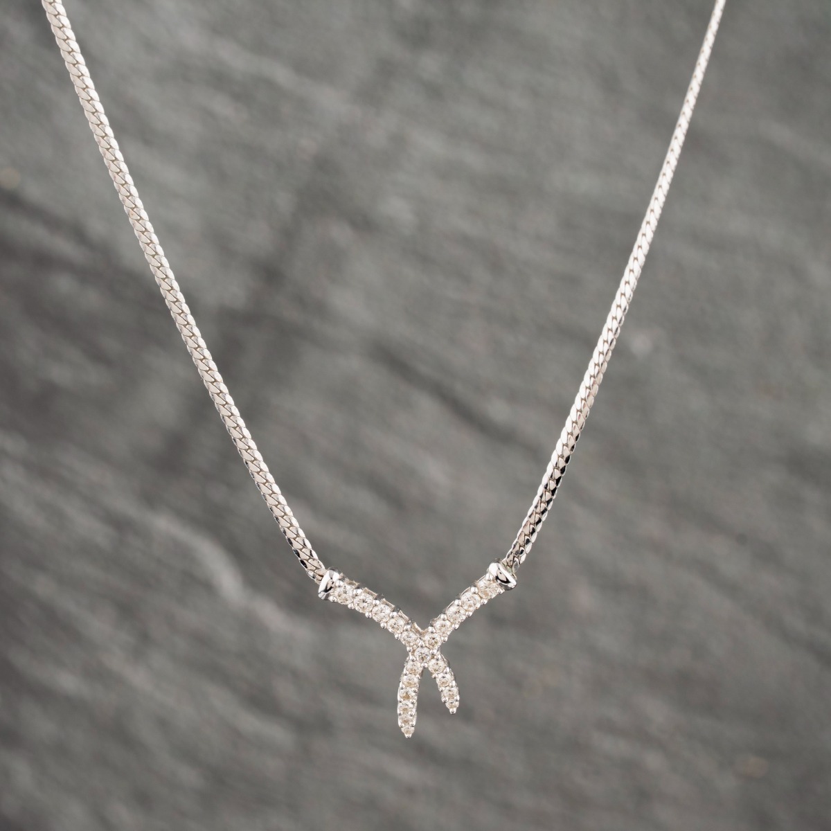 Pre-Owned 9ct White Gold 0.50ct Brilliant Cut Diamond Crossover Pendant & 16 Inch Herringbone Chain 41142413