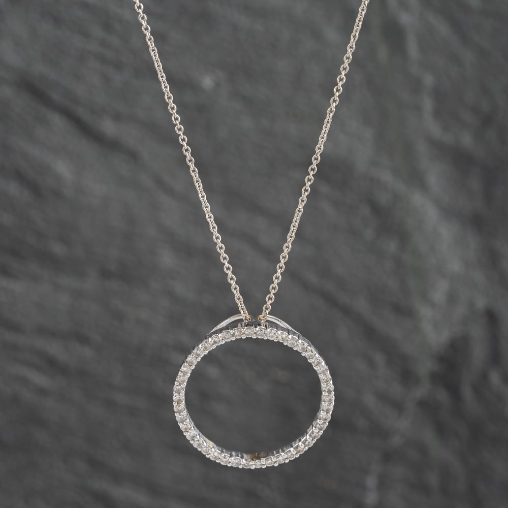 Click to view product details and reviews for Pre Owned 14ct White Gold 078ct Brilliant Cut Diamond Circle Pendant And 18 Inch Trace Chain 41142417.