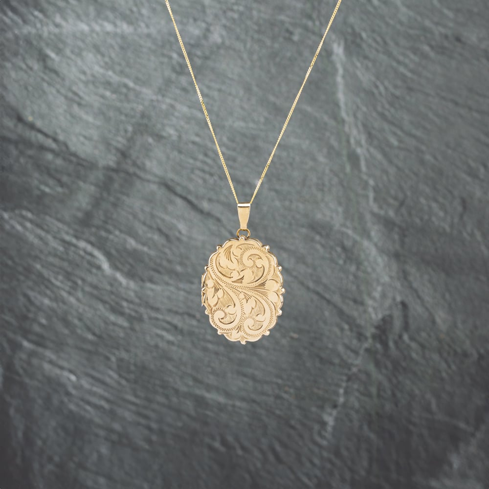 Click to view product details and reviews for Pre Owned 9ct Yellow Gold Oval Hand Engraved Locket Pendant And 18 Inch Curb Chain 41142733.