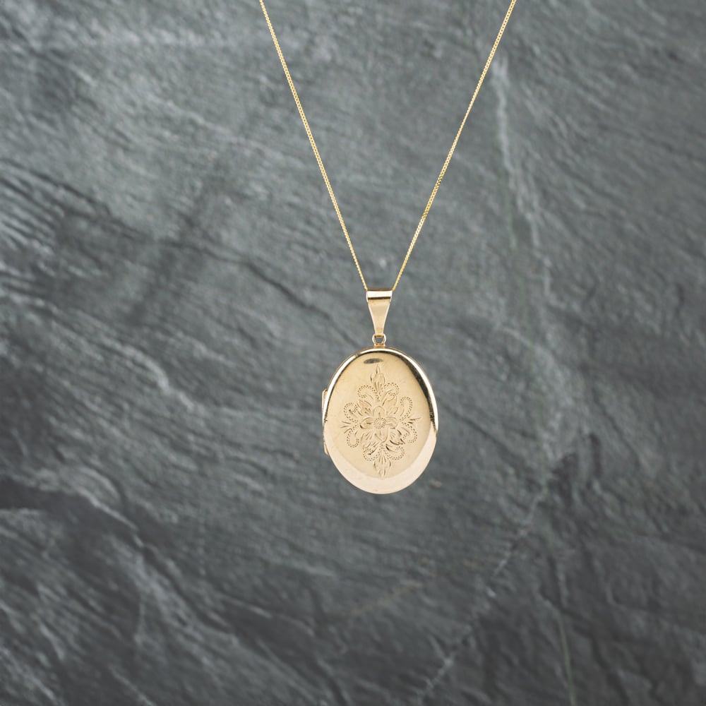 Click to view product details and reviews for Pre Owned 9ct Yellow Gold Hand Engraved Oval Floral Design Locket Pendant And 18 Inch Curb Chain 41142736.