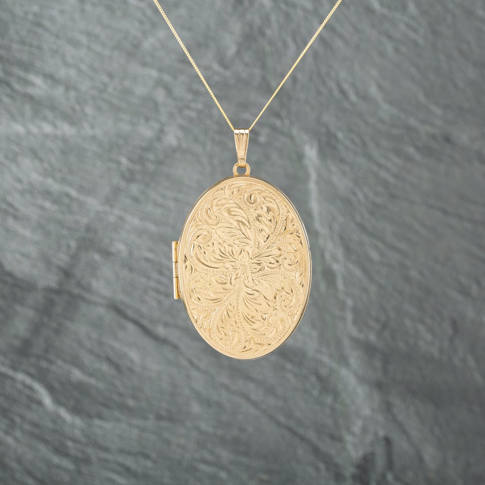 Click to view product details and reviews for Pre Owned 9ct Yellow Gold Large Oval Patterned Locket Pendant And 18 Inch Curb Chain 41142742.