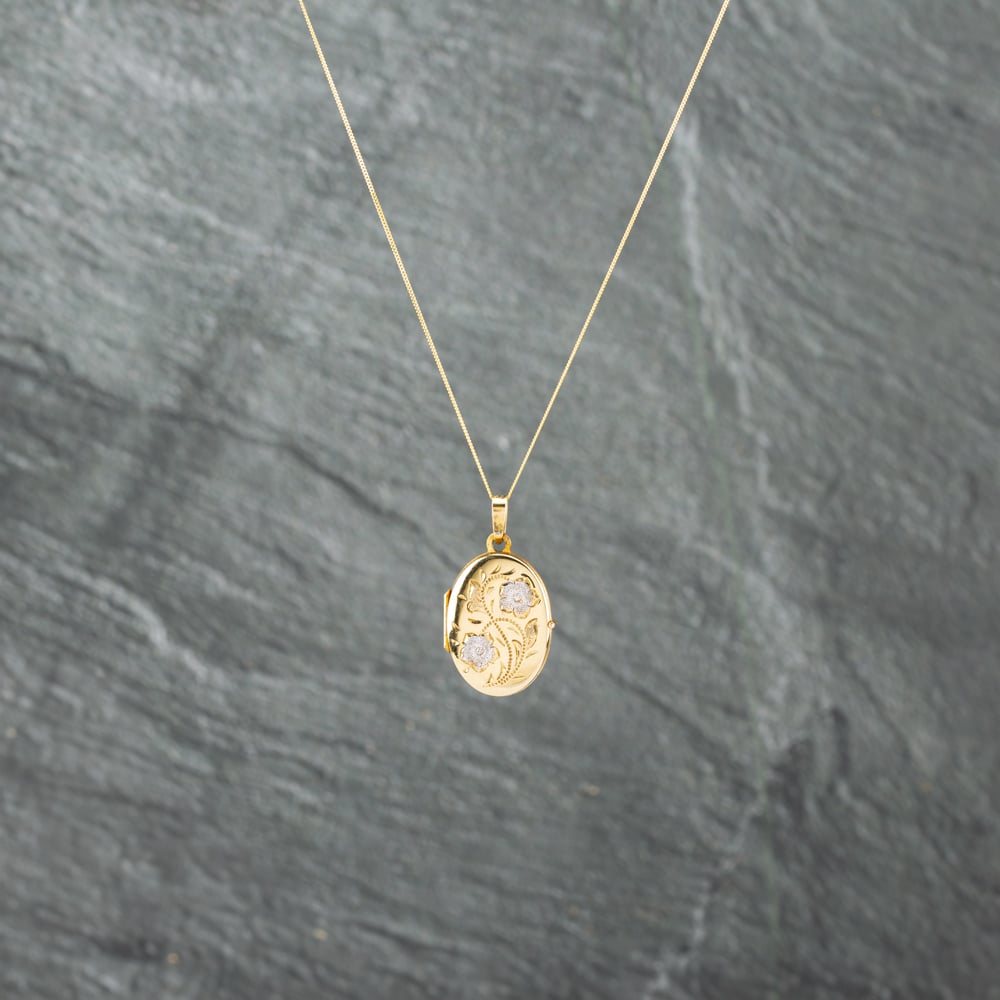 Click to view product details and reviews for Pre Owned 9ct Two Colour Gold Oval Flower Design Locket Pendant And 18 Inch Curb Chain 41142751. Click to view product details and reviews for Pre Owned 9ct Two Colour Gold Oval Flower Design Locket Pendant And 18 Inch Curb Chain 41142751.